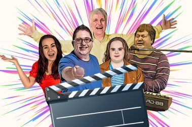 A vibrant, cartoon-style illustration of five cheerful performers posing in front of a colourful burst background. They stand behind a large film clapperboard, symbolising performance or production.