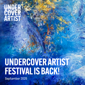 White text reading "Undercover Artist Festival is Back! September 2025" is placed on top of an abstract blue and gold painting. The Undercover Artist Festival logo is positioned on the top left-hand corner in white.